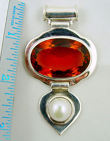 Rahu Hessonite and Pearl Astrological pendant.