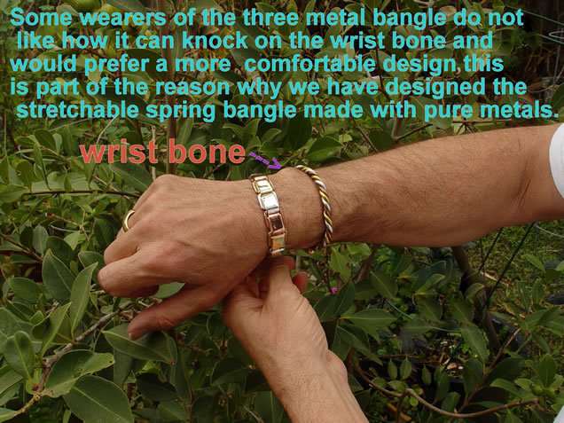 3 metal spring bangle on wrist
